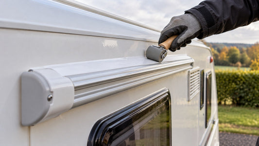Rolling sealing tape along the top of a caravan awning rail