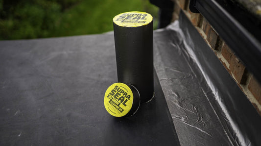 Rolls of Supraseal weatherproofing tape on a finished flat roof