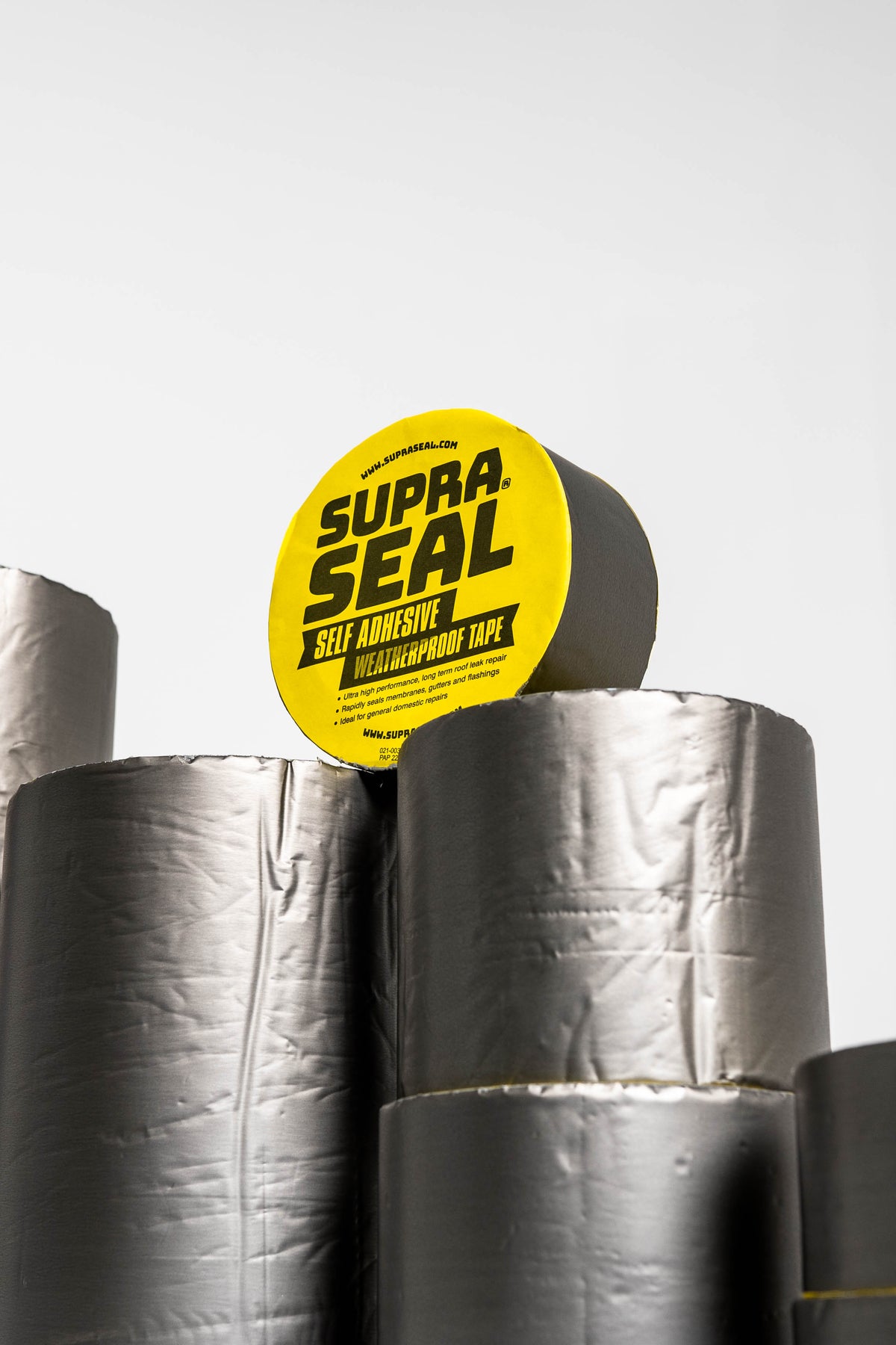 Stack of Supraseal flashing tape rolls in different widths
